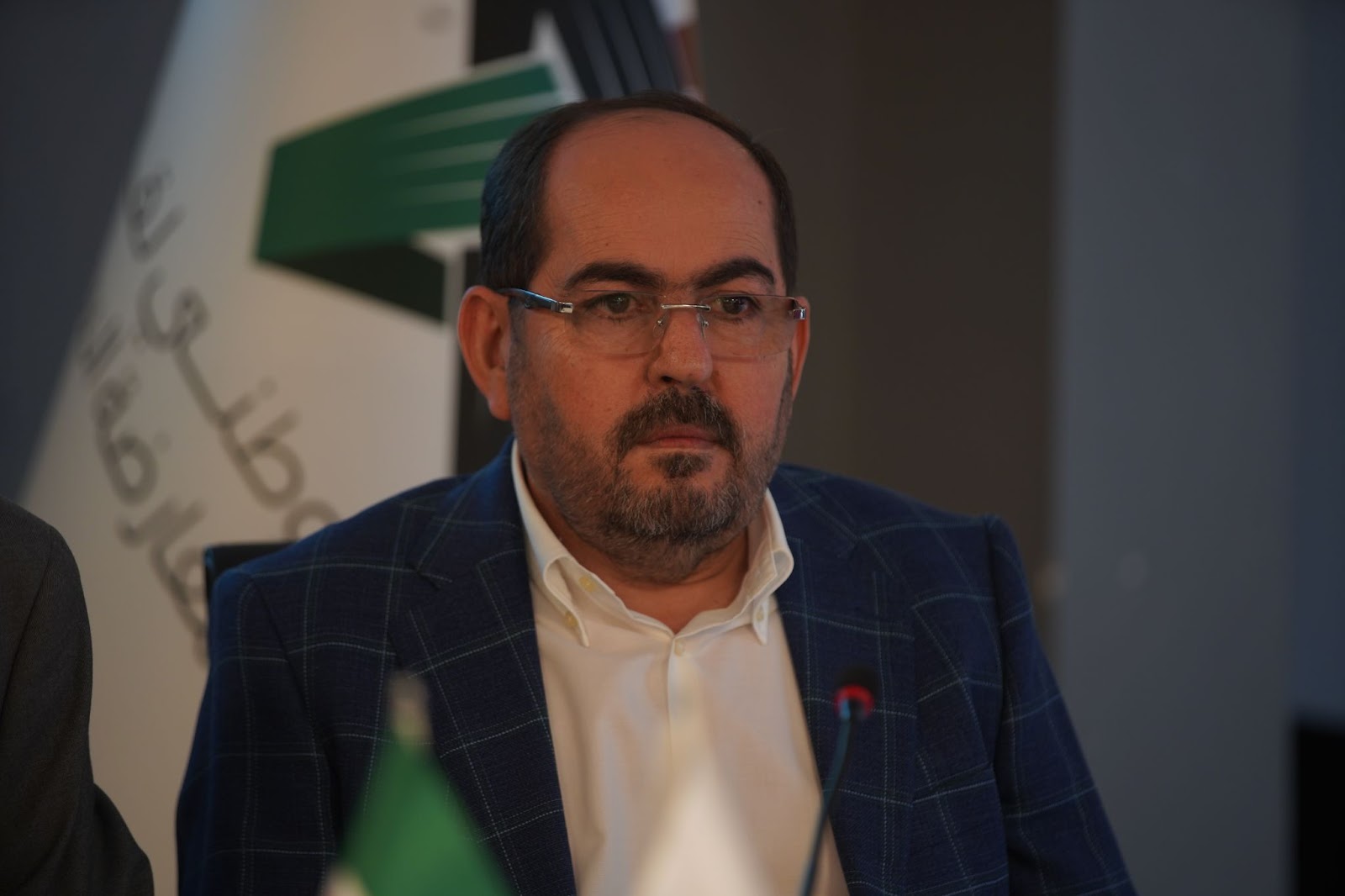 عبد الرحمن مصطفى يقدم تقرير عمل الحكومة السورية المؤقتة أمام الهيئة العامة